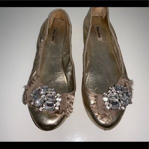Miu Miu gold jeweled ballet flats
